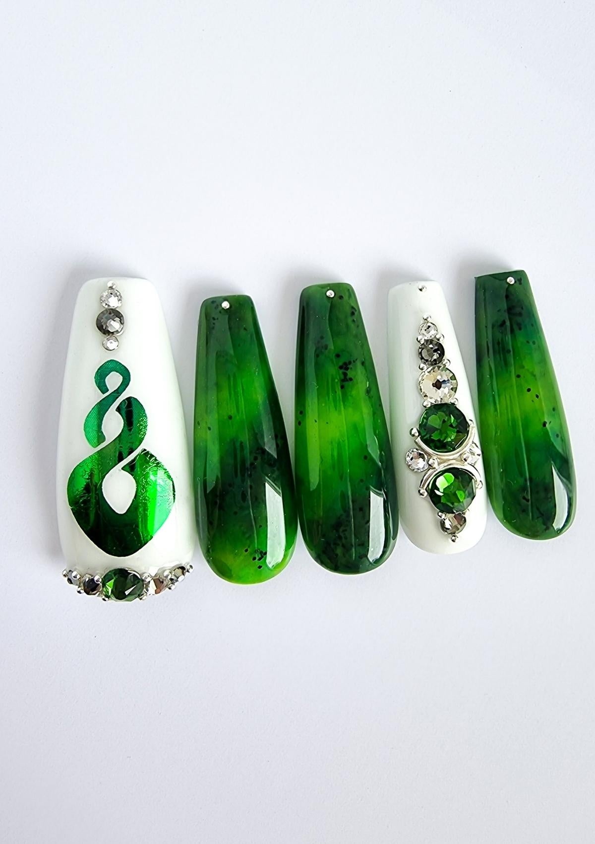 White and pounamu greenstone press-on nails with matching Swarovski crystals and green Maori Nail Foils