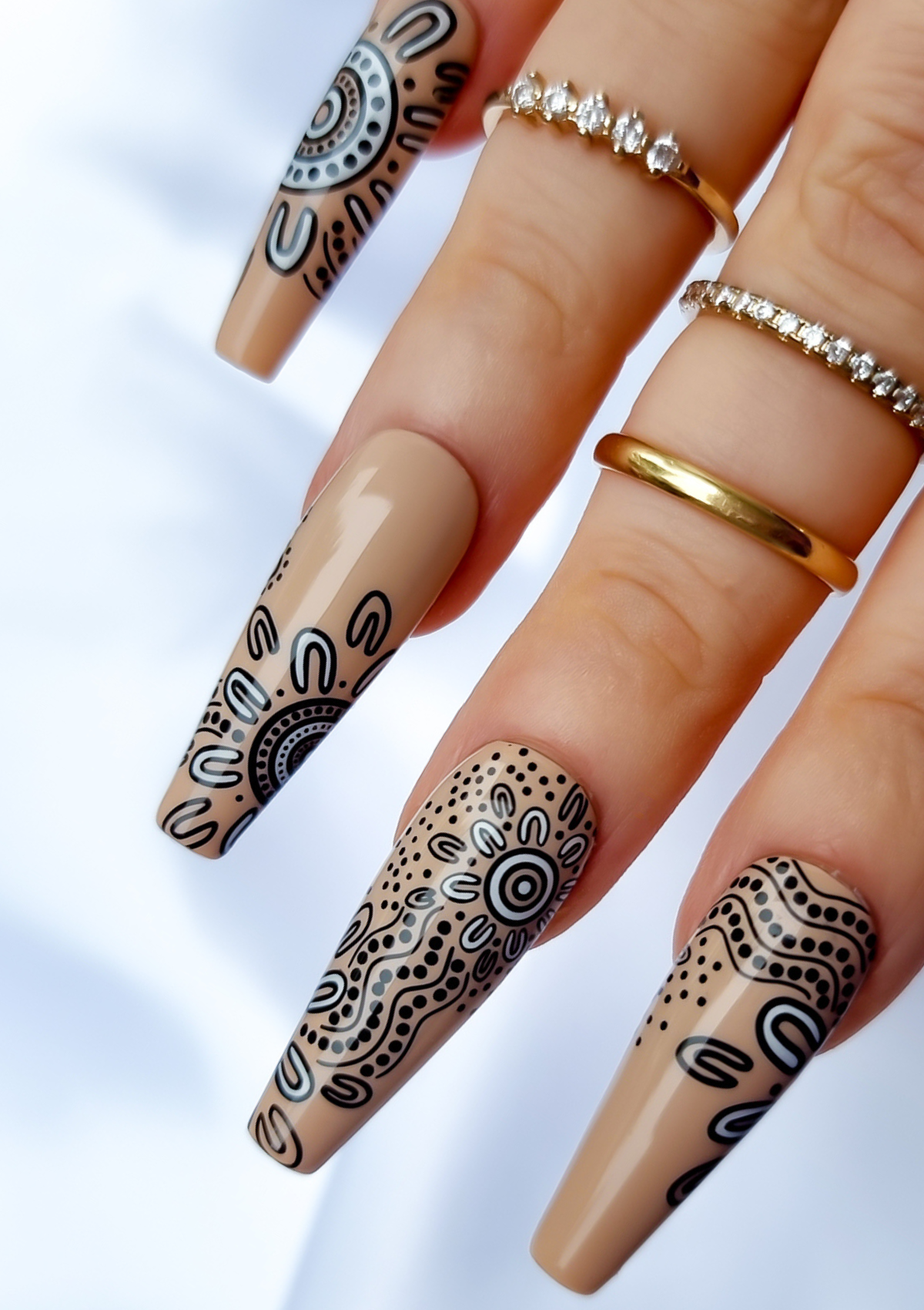 Nude nail with black and white Aboriginal Australian nail art designs