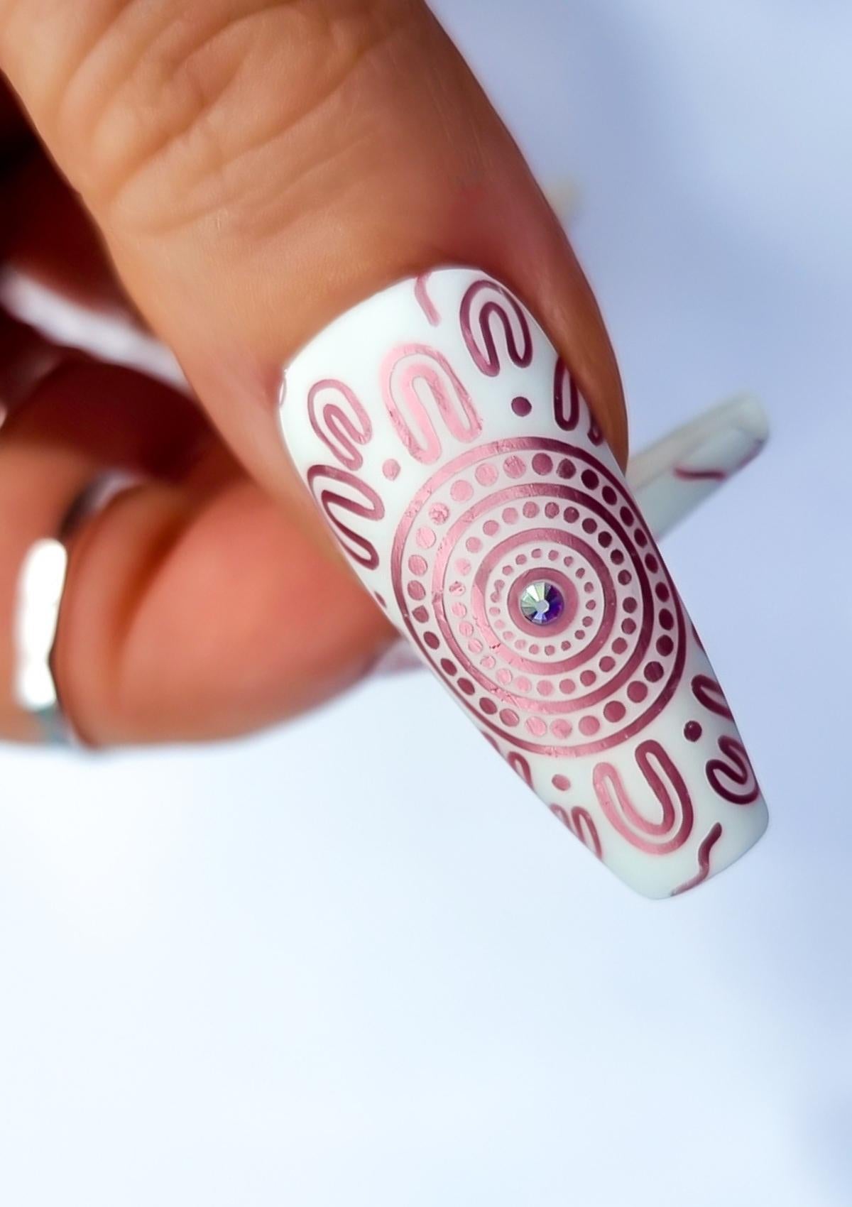 White nails with pink Aboriginal Australian nail art designs
