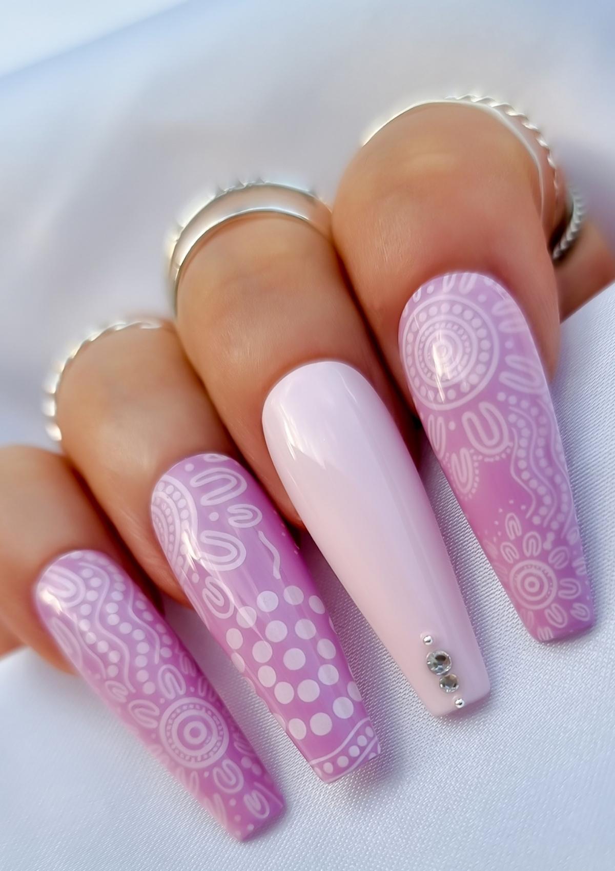Pink nails with baby pink Aboriginal Australian nail art designs