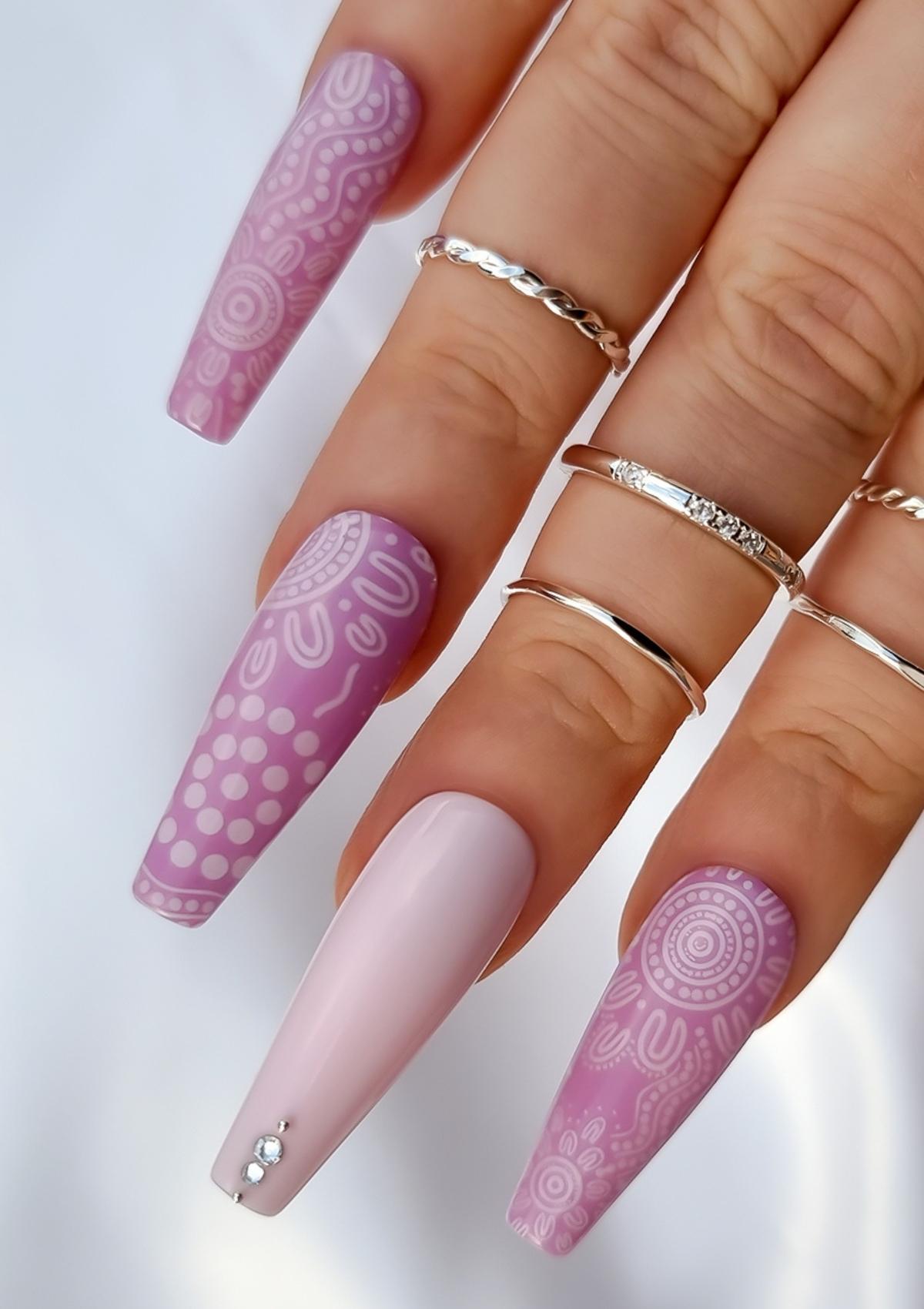 Pink nails with baby pink Aboriginal Australian nail art designs