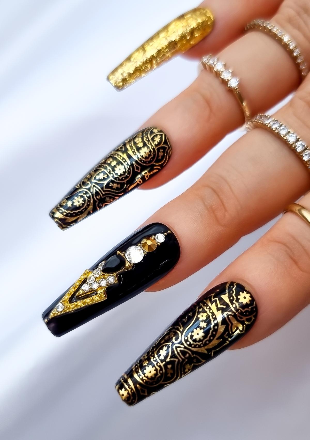 Gold and black nails with gold paisley bandana print 